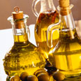 three bottles of olive oil